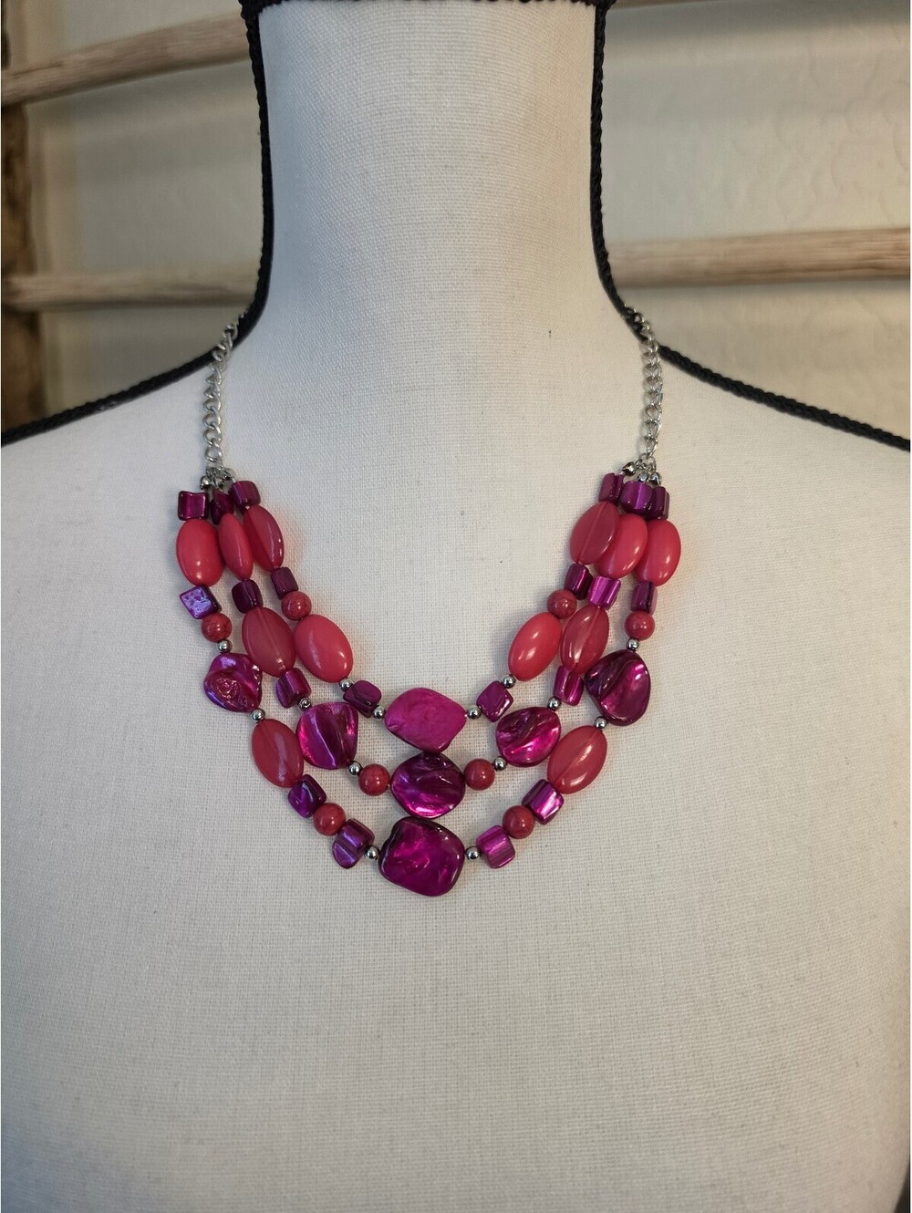 Pink multi strand bead necklace